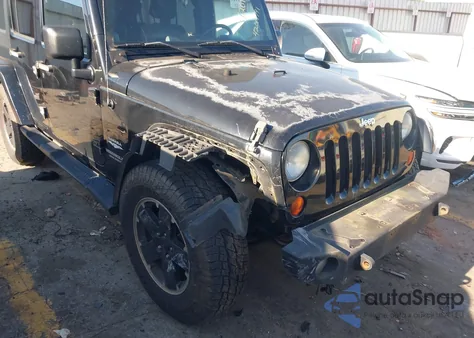 2010 Jeep Wrangler Unlimited Sahara from USA, damaged, VIN 1J4HA5H16AL145869